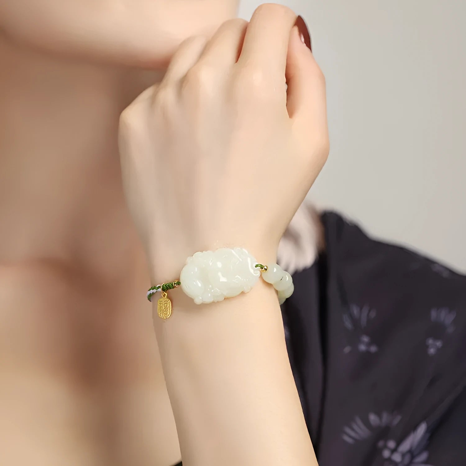 Year of Rabbit Chinese zodiac bracelet with Hetian jade charm, S925 silver card, and red ice cotton rope.