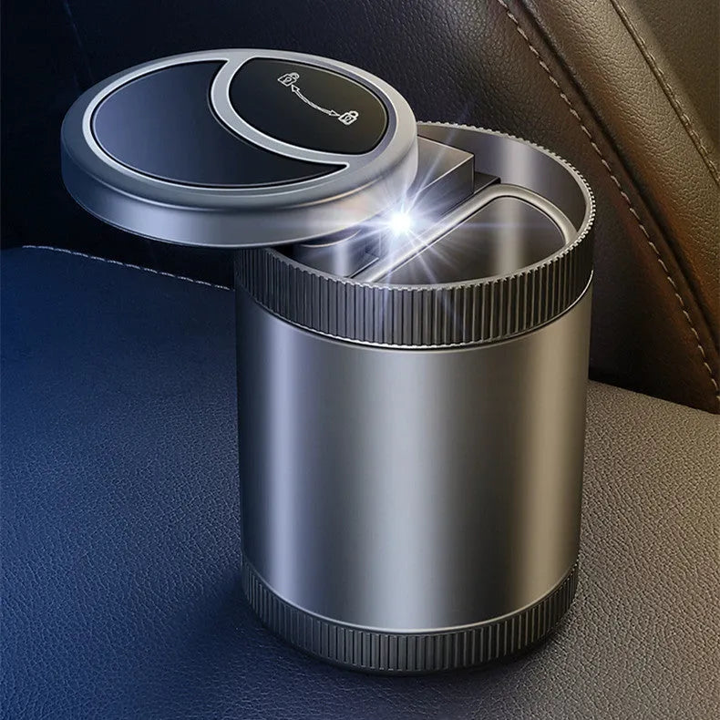 Automatic sensing vehicle ashtray with USB port in grey, black, red, or blue.