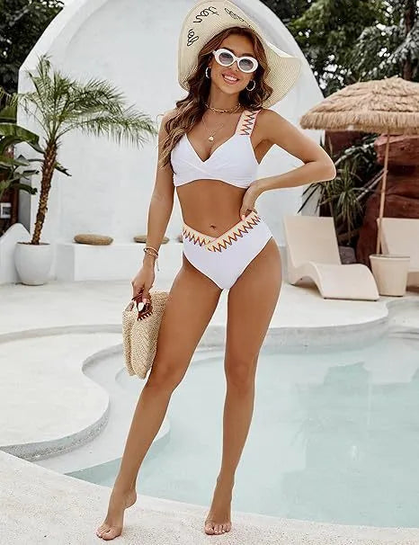 Black lace-up bikini top with high-waist bottoms on a white background.