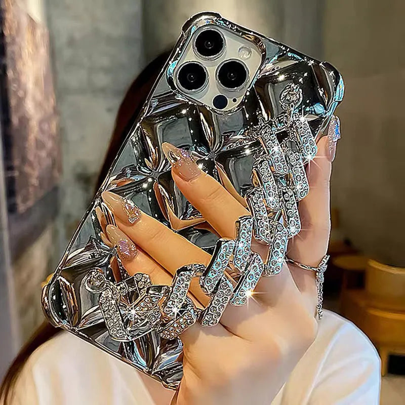 iPhone case with attached luxury diamond bracelet chain in silver or gold colour with flash diamond lock