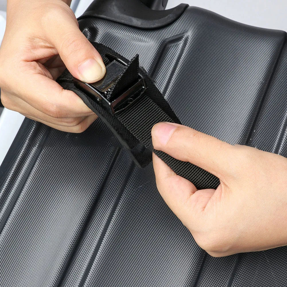 Black folding soft roof rack on a car roof, made of 600D Oxford cloth, with webbing straps and metal buckles