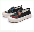 Women's canvas slip-on shoes with plastic injection-moulded sole and decorative sewing thread details