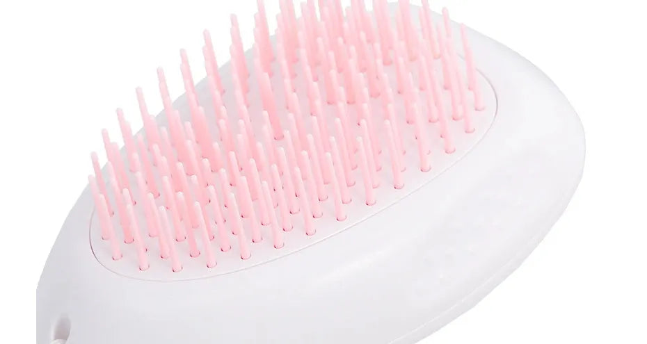 White pet hair brush for cats and dogs made of ABS plastic with compact dimensions 7.2 x 10.6 x 4.2 cm