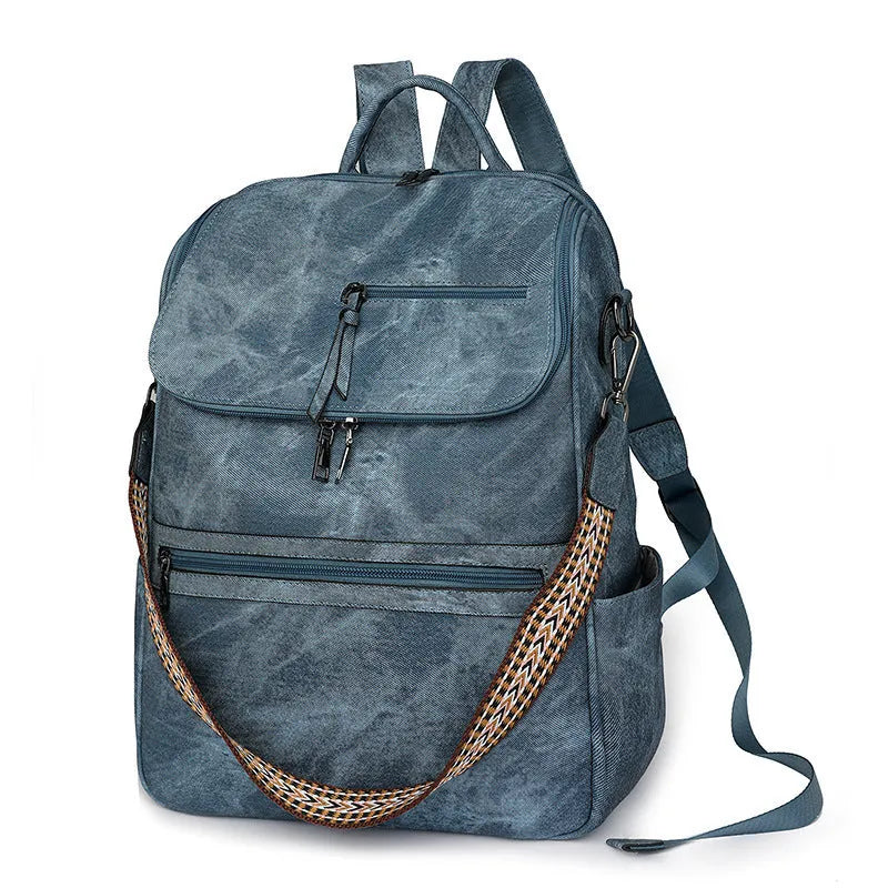 PU leather college backpack with curved shoulder strap in solid colour with stitching detail.