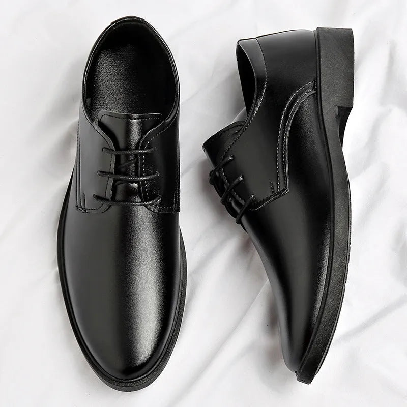 Men's black round toe pointed cap low top PU formal shoes with stitched detailing on white background