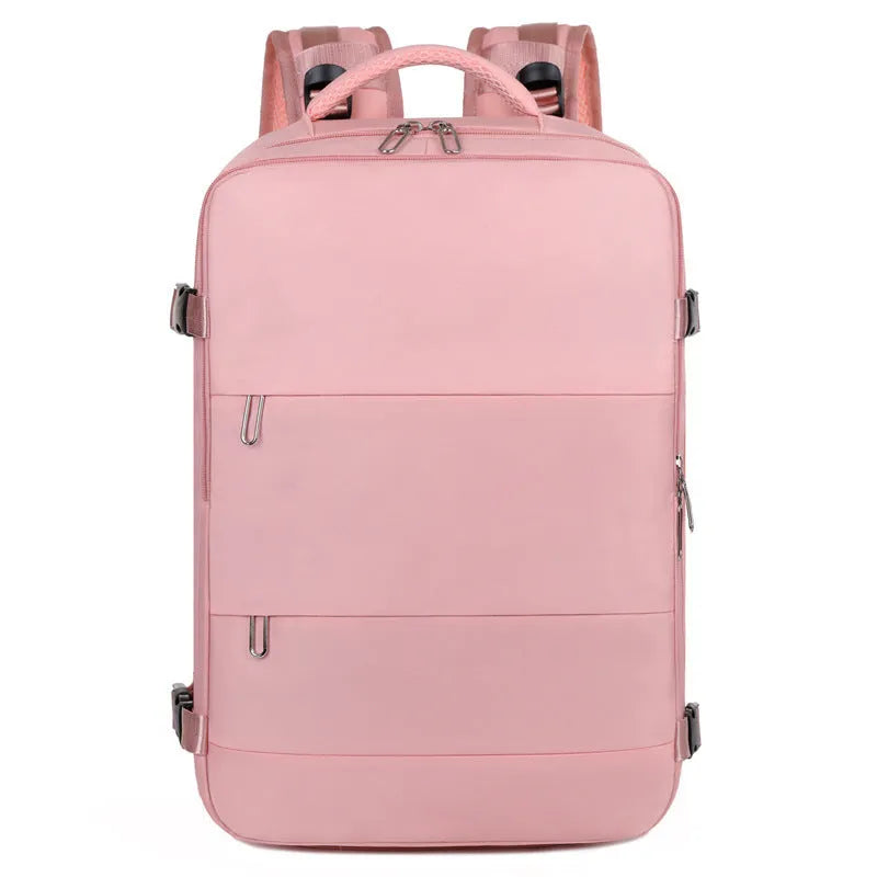 Large purple travel backpack with multiple compartments open, showing laptop sleeve and organiser pockets.