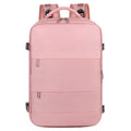 Large purple travel backpack with multiple compartments open, showing laptop sleeve and organiser pockets.