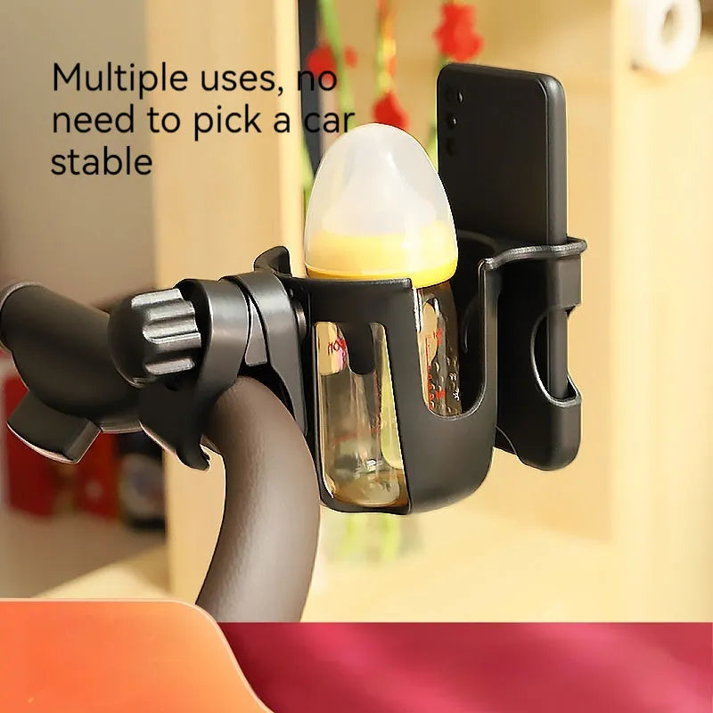 Black, green, and pink ABS plastic car cup holder measuring 19cm by 10cm by 11.3cm.