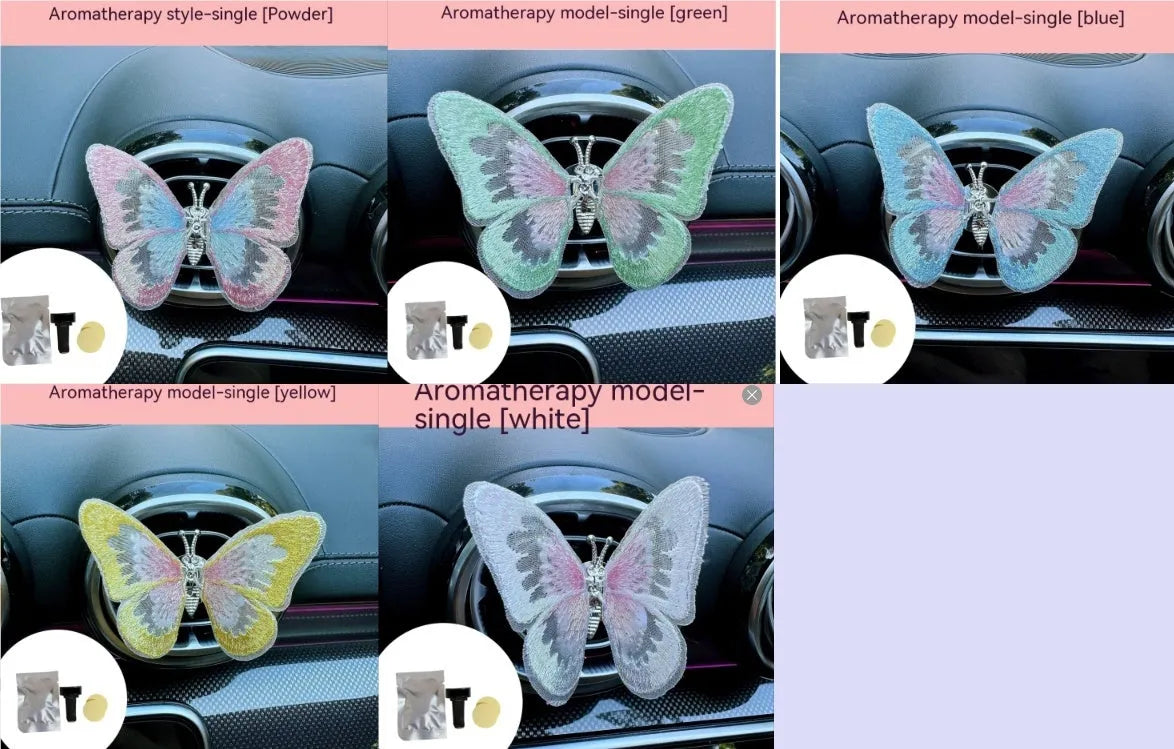 Soft fabric embroidered butterfly car air vent decoration in multiple colour options on a centre console.