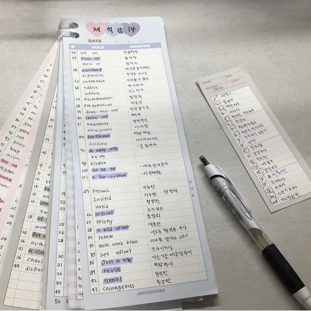 Vertical half-B5 notepad with printed lines for English words, in blue cover.