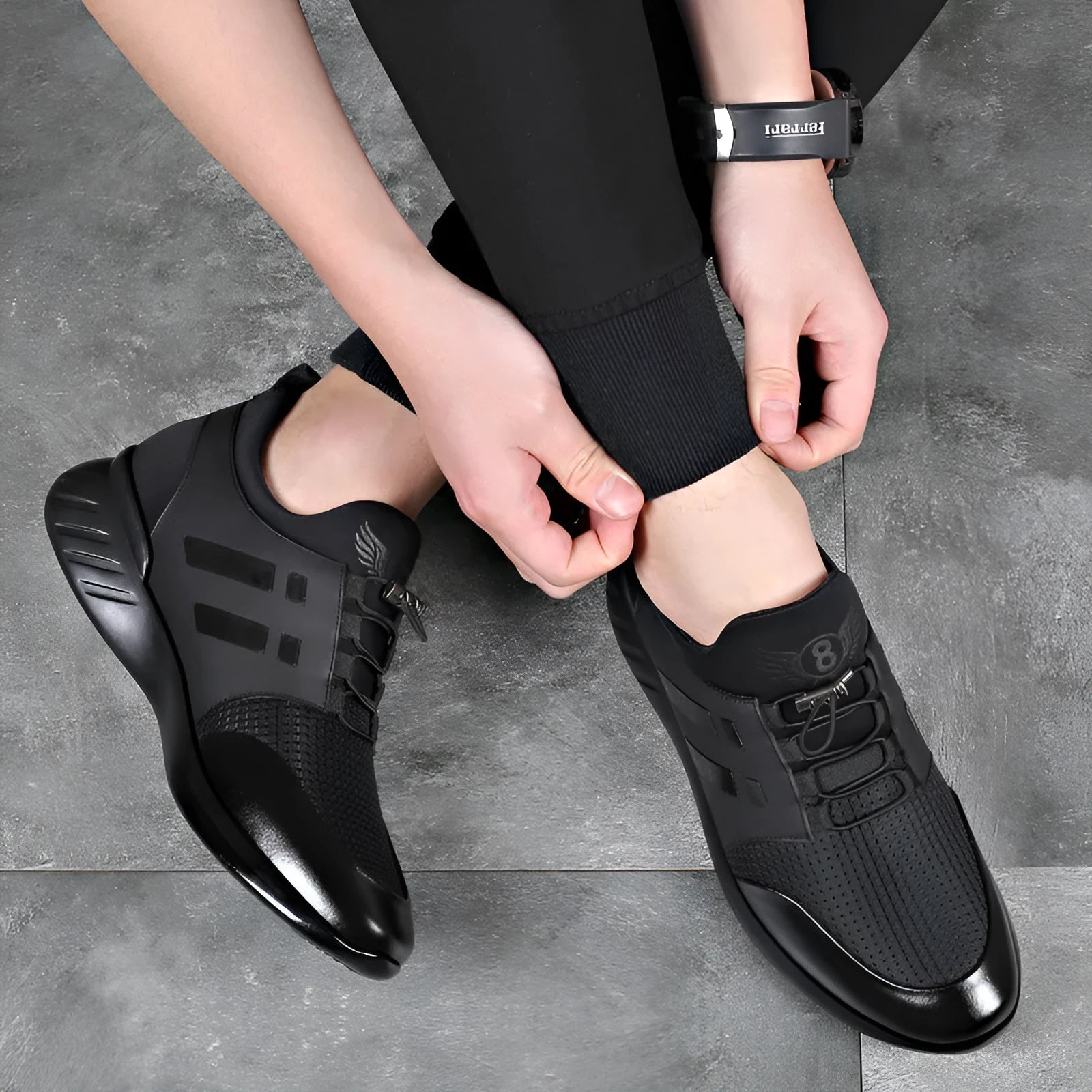 Men's black casual shoe with hidden 8cm heel for invisible height increase, available in leather or mesh.