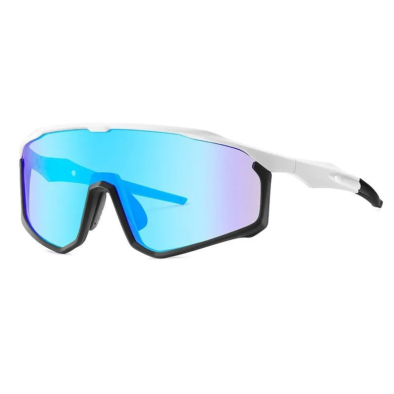 Colourful mountaineering goggles for climbing and snow sports on a neutral background.