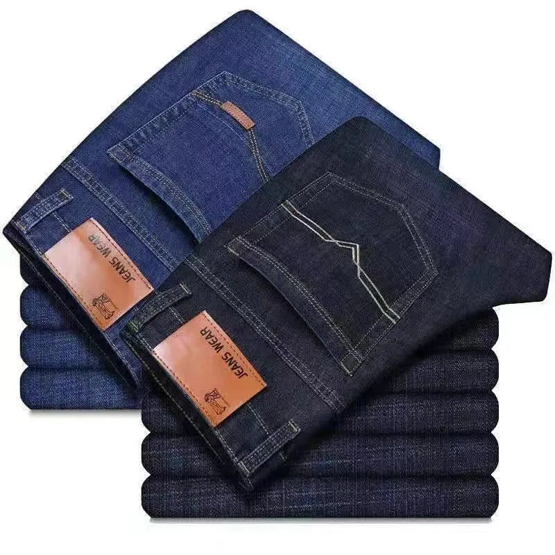 Elastic men's straight tube loose casual jeans in denim, blue colour, side view showing straight leg and waistband