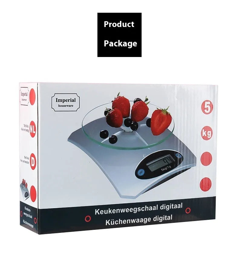 Simple mini kitchen electronic scale in silver white colour on a flat surface, showing weighing display.