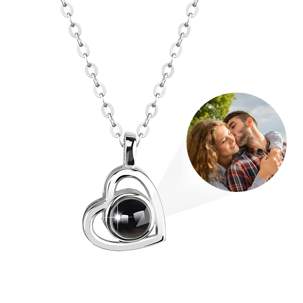100 Languages I Love You necklace with heart-shaped charm showing custom photo projection inside, in gold finish