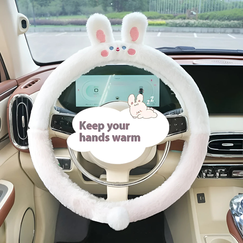 Plush faux fur steering wheel cover with embroidered cartoon bear face, fitted on a car steering wheel
