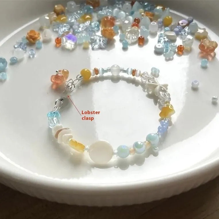 Orange sea theme adjustable alloy bracelet with diamond shape and round decorative elements