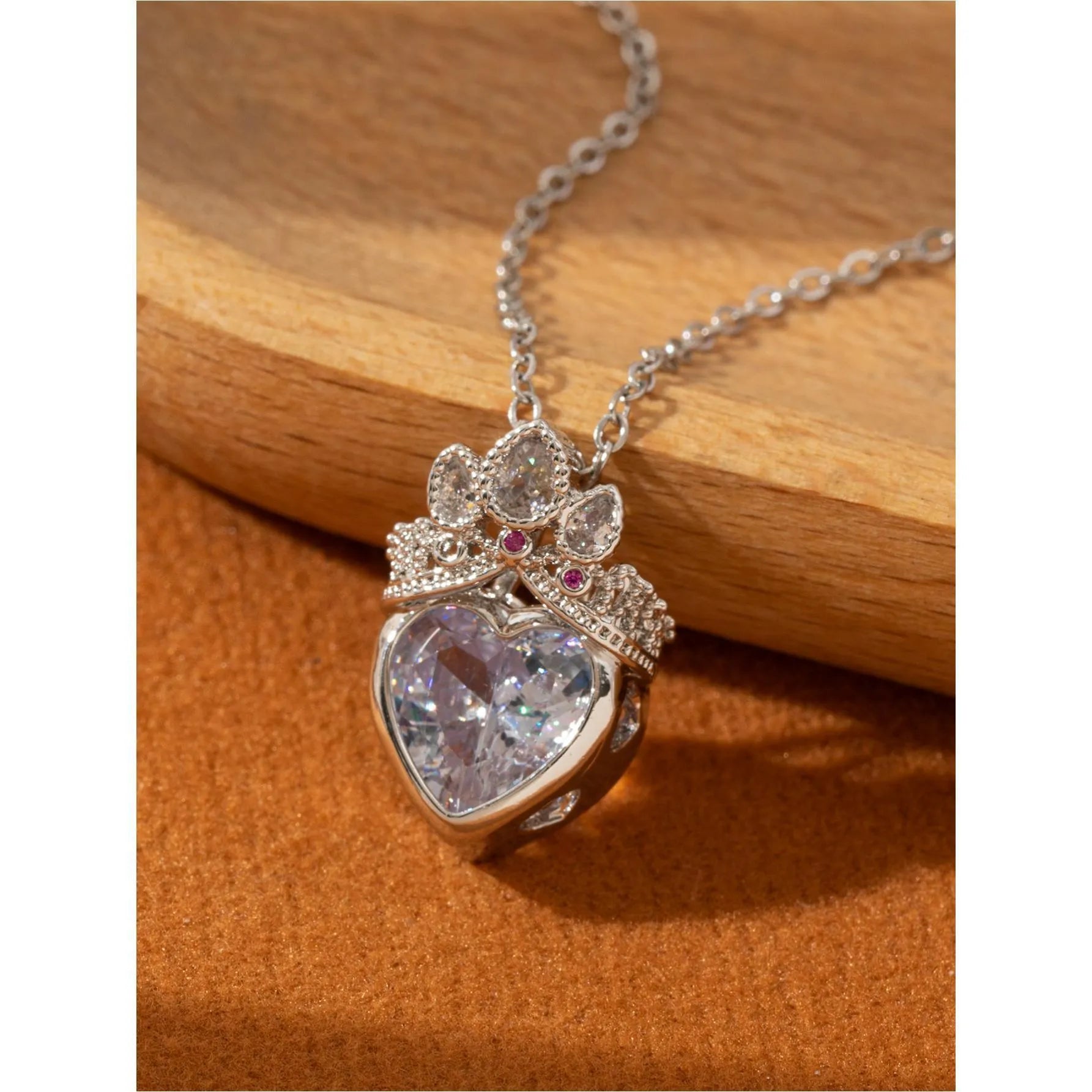 Crown and heart shaped zircon pendant necklace in Blue Gold on adjustable copper O-ring chain