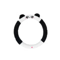 Plush faux fur steering wheel cover with embroidered cartoon bear face, fitted on a car steering wheel