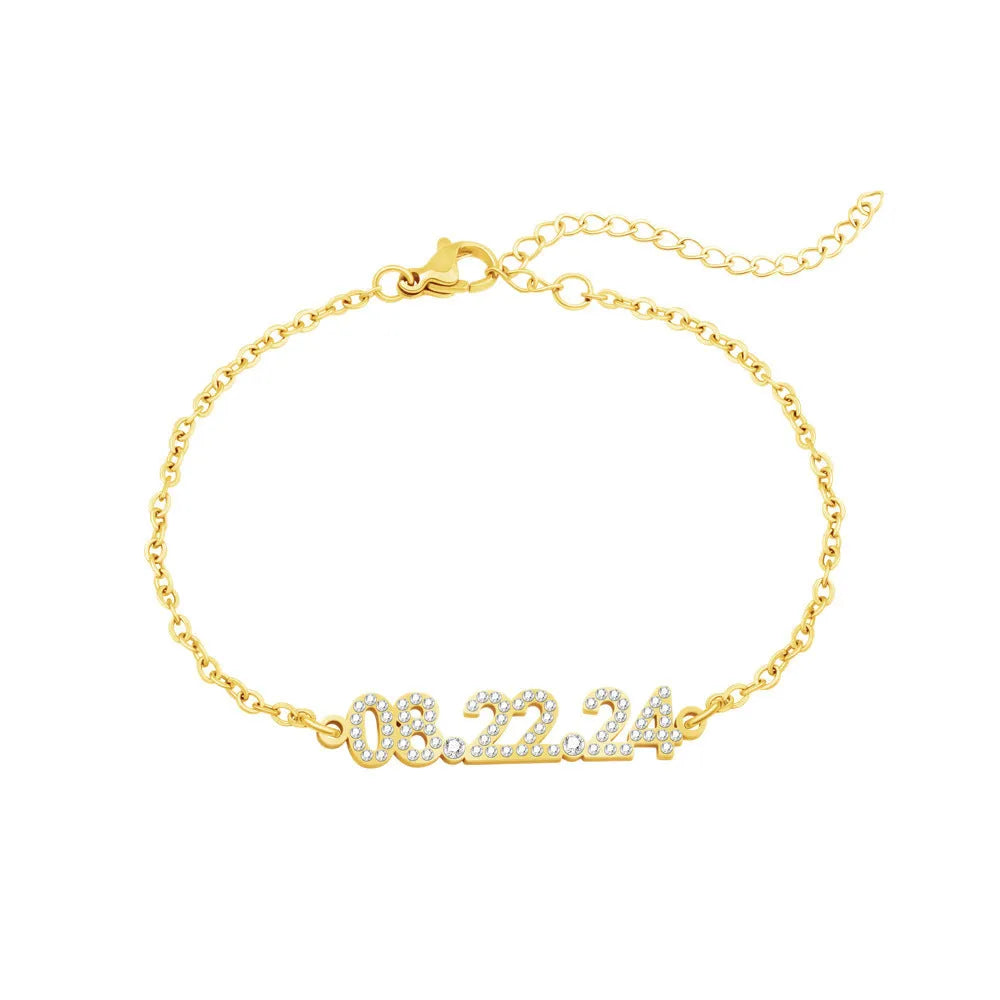 Stainless steel digital bracelet with diamond-studded numbers in gold finish