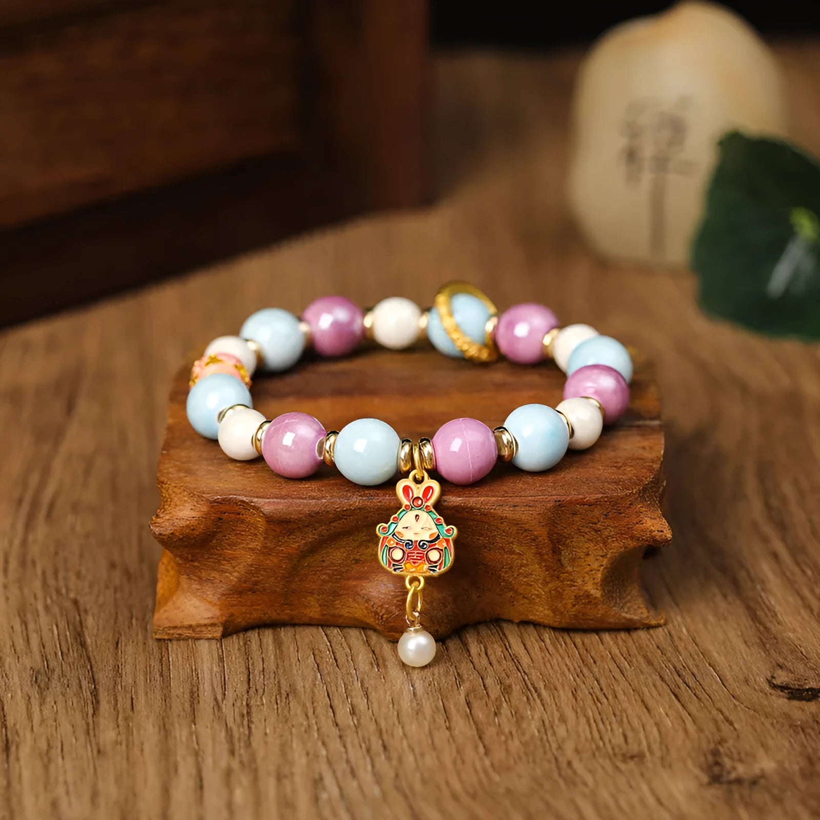 Lucky Rabbit handmade ceramic bracelet with gray porcelain glaze on an adjustable cord.