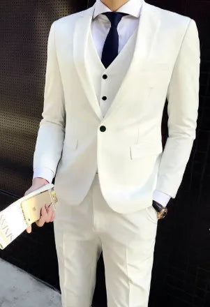 Men's white slim fit cotton blend suit set with jacket, vest, and trousers on a hanger