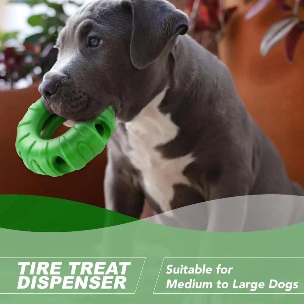Blue rubber tyre dog chew toy with oval openings for food dispensing