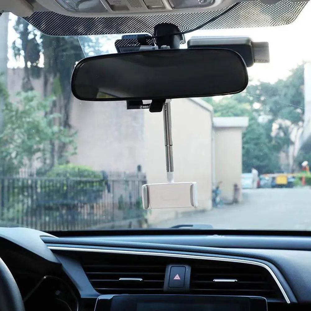 Black car windscreen phone holder with 360-degree rotating head on a suction cup mount.