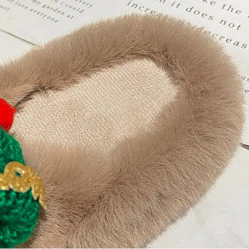 Women's Christmas hat decoration faux plush slippers with cotton lining and a rubber sole.