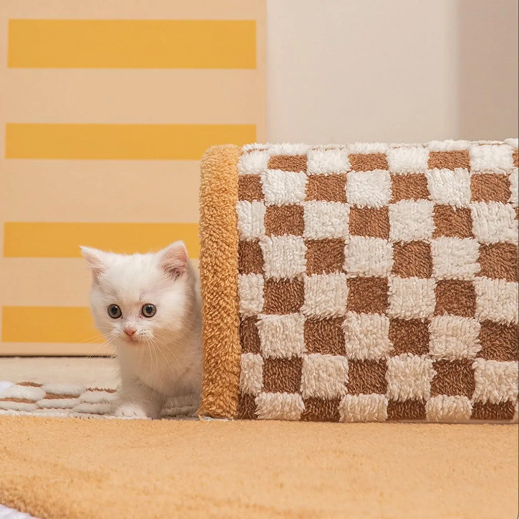 Fan-shaped plush pet bed for dogs and cats with a central tunnel, shown in a yellow colour.