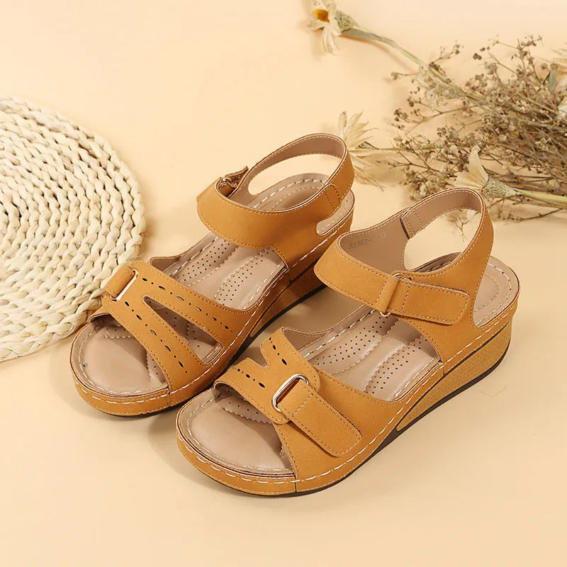 Women's wedge sandals with Velcro strap, platform rubber sole, fish mouth toe, available in red, black, brown and off-white.