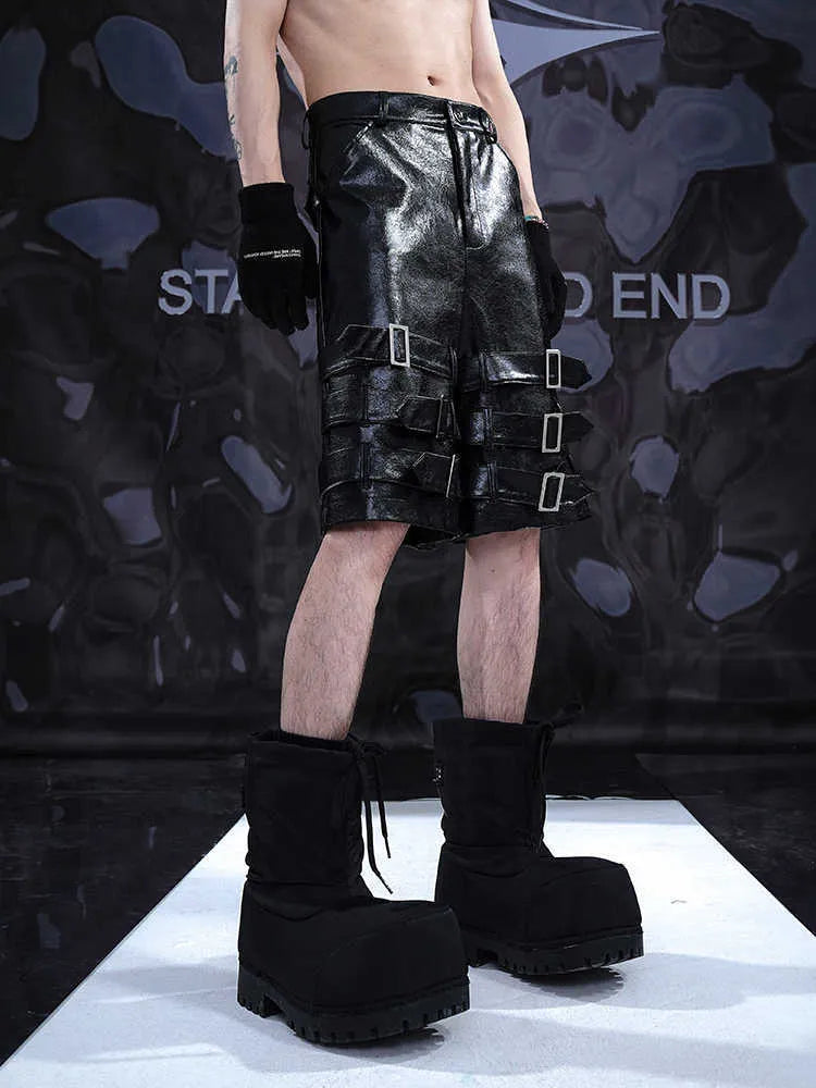 Men's black PU leather cropped pants with leather ring detailing on waistband