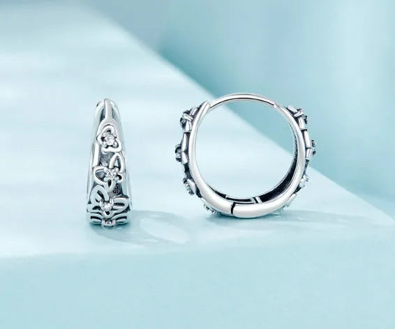 Retro hollow butterfly sterling silver 925 earrings with zircon accents, 14mm tall.