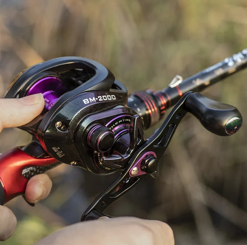 Colourful BM2000 fishing reel with magnetic brake system, shown in left-hand and right-hand retrieve options.