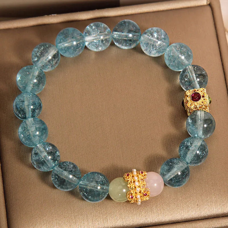 Women's Chinese style crystal bracelet with blue cube sugar beads and colourful stones on flexible ring