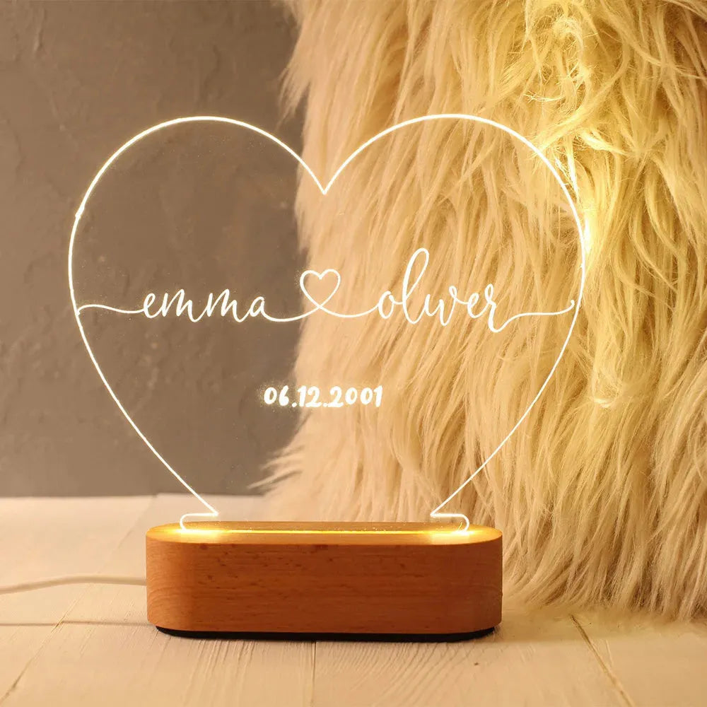 Transparent custom acrylic night light with personalised text, measuring 20cm by 11.5cm.