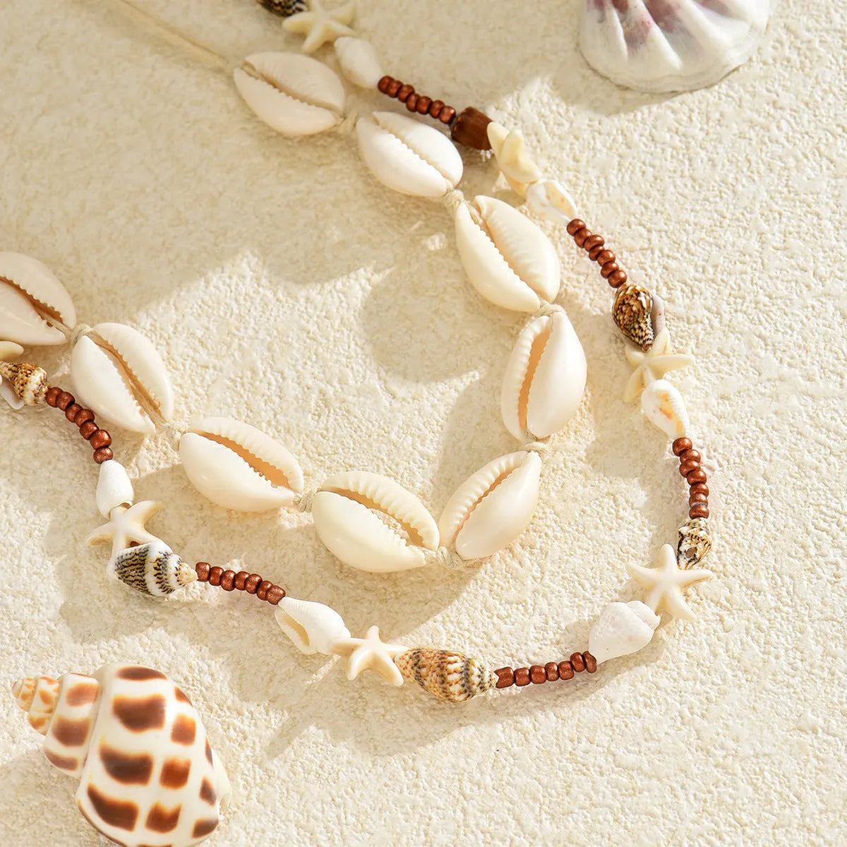 Handmade geometric shell necklace in X1900 colour with bohemian style pendant on regular chain