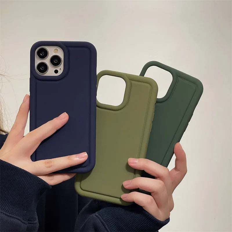 Silicone soft phone case for iPhone in black, showing rear cutout for camera and side buttons