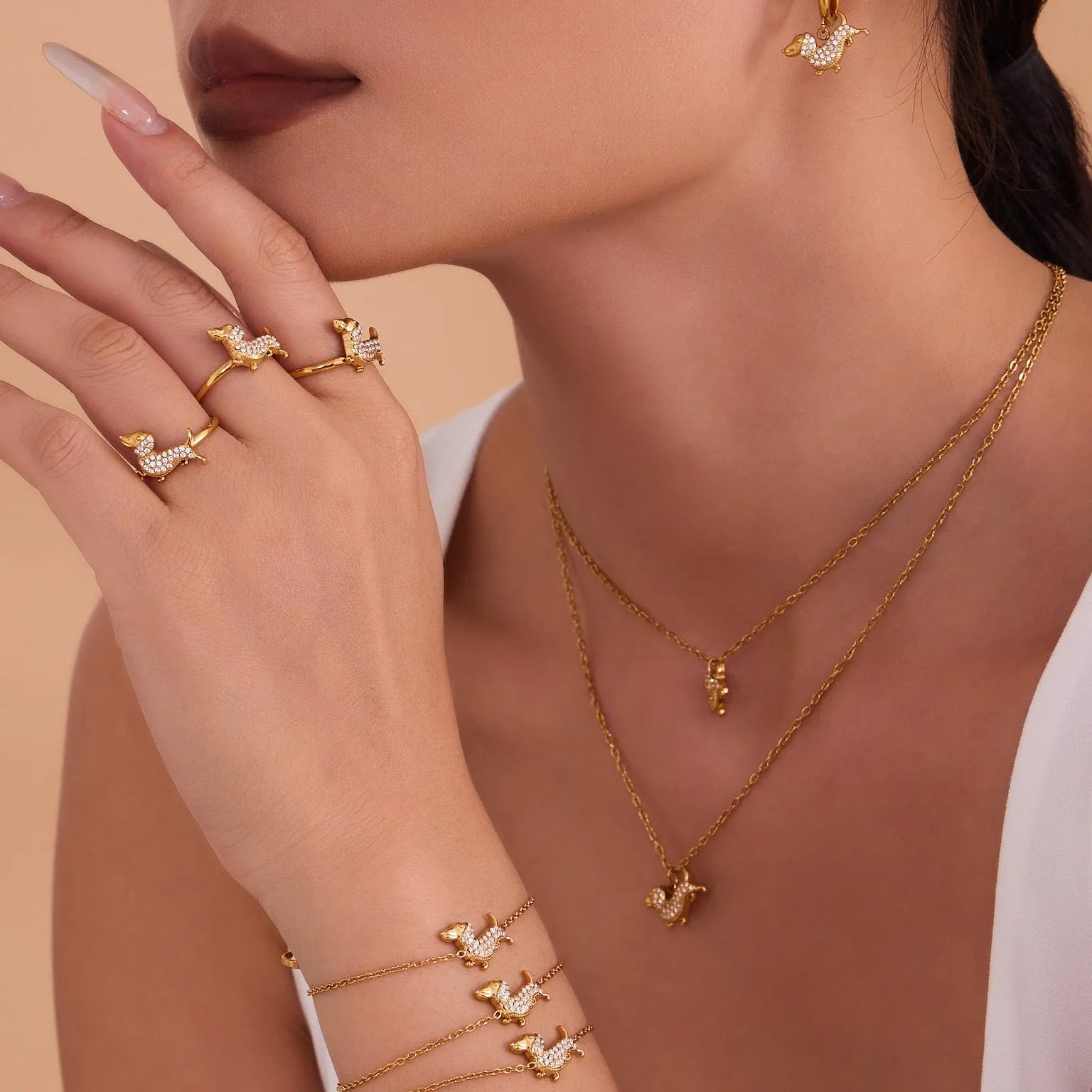 Gold puppy zircon bracelet with chain pattern and full zirconium accents on titanium steel