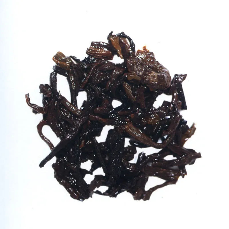 Dayi Tea 2012 Pu'er tea cake wrapped in conventional tissue paper packaging for commercial use