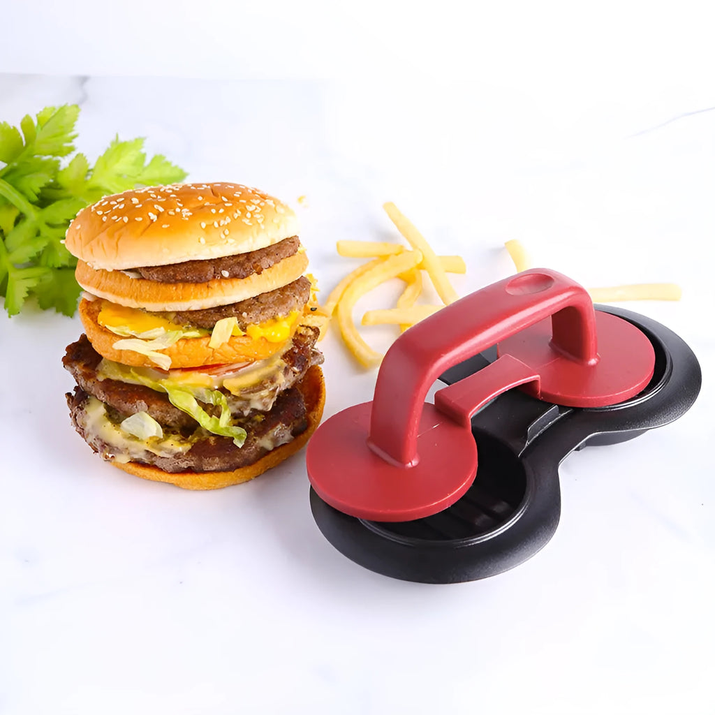 Black and red round burger press with non-stick surface and oil paper liners.