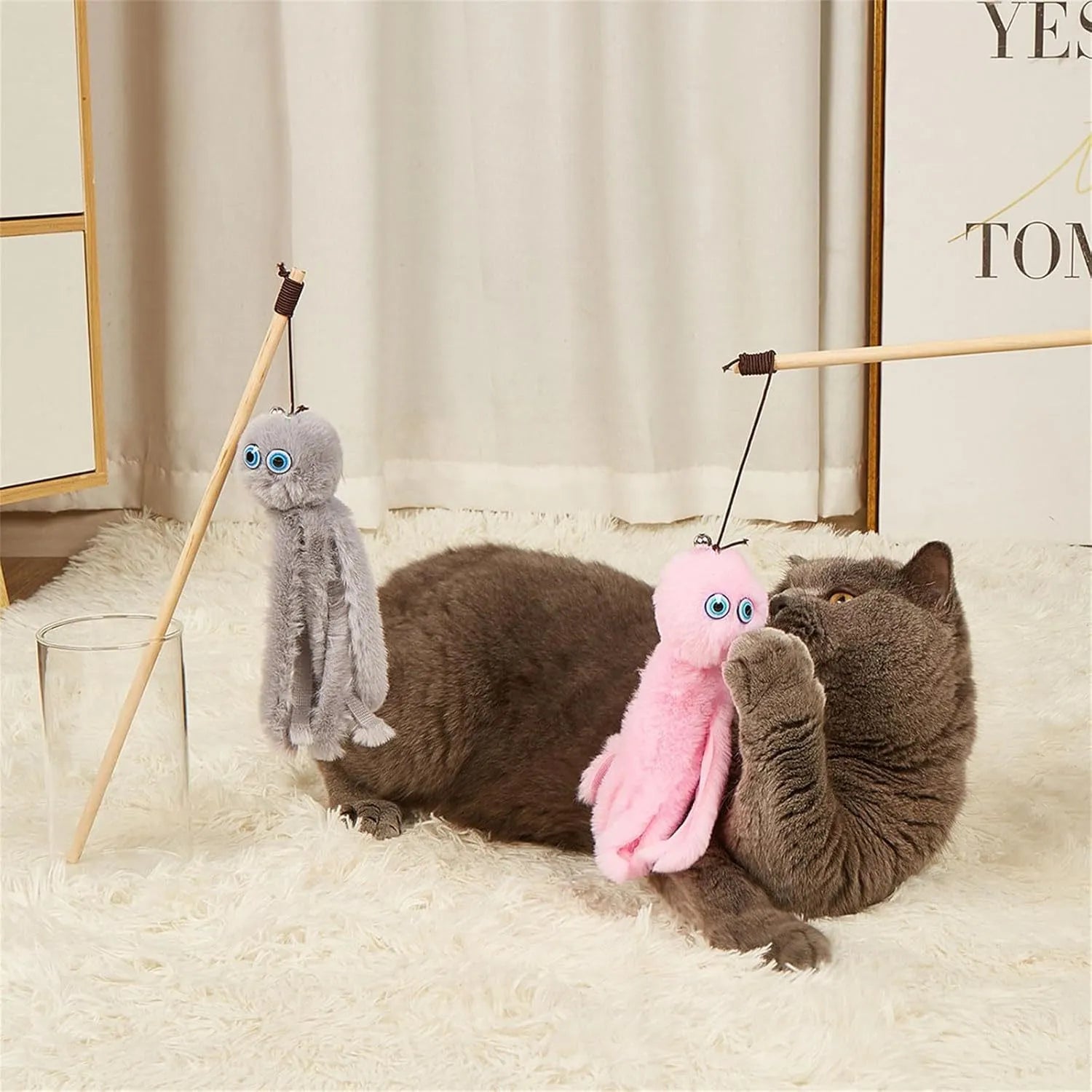 Colourful octopus cat toy with long stick and feather elements for indoor play
