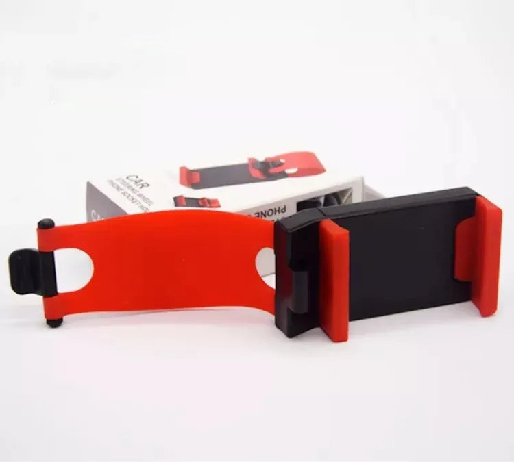 Black universal car steering wheel mobile phone holder made of ABS plastic shown mounted on a steering wheel.