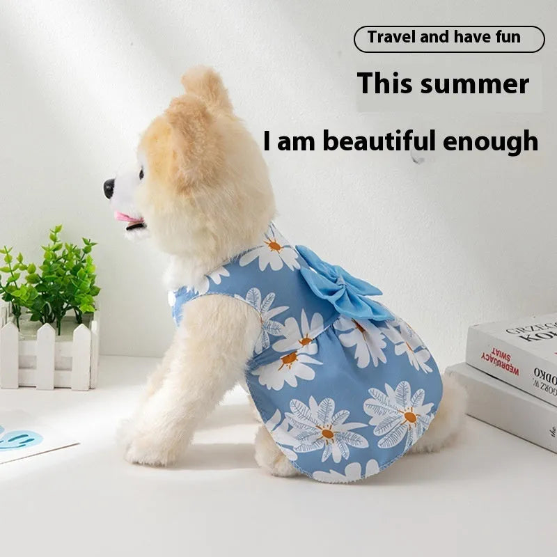 Ultra-thin floral butterfly knot princess dress for a dog or cat in summer, shown with a blue bow.
