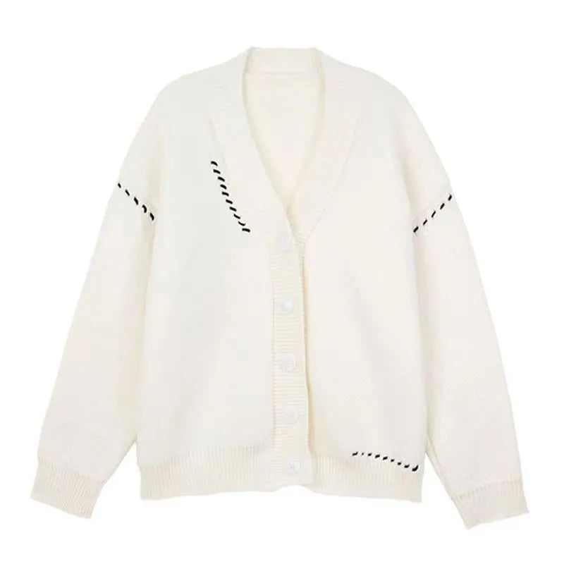 Women's loose-fitting knitted cardigan top coat in black, showing long sleeves and solid colour design.