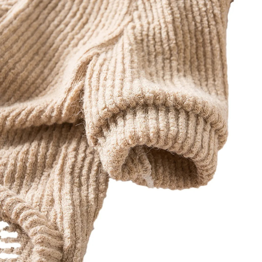 Brown cloth dog sweater pullover on a small breed dog.