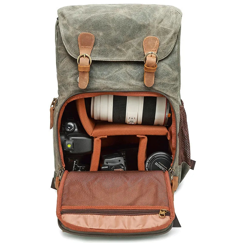 Canvas DSLR camera backpack in khaki colour, showing backpack straps and main compartment.
