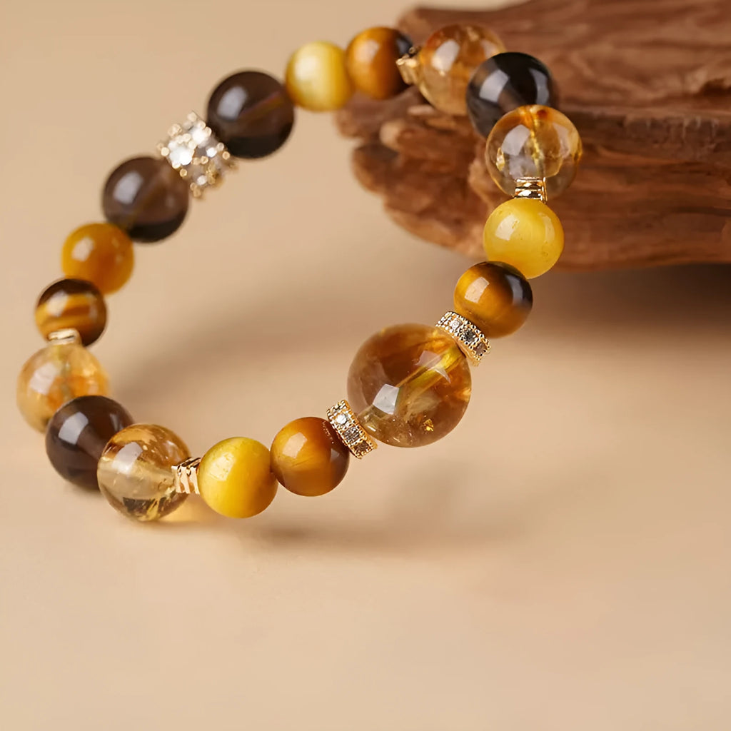 Lucky Jinba natural tiger-eye crystal bracelet with geometric beads in yellow tower style.