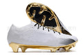 Men's low top football shoes with knitted upper, lace-up closure and FG studs
