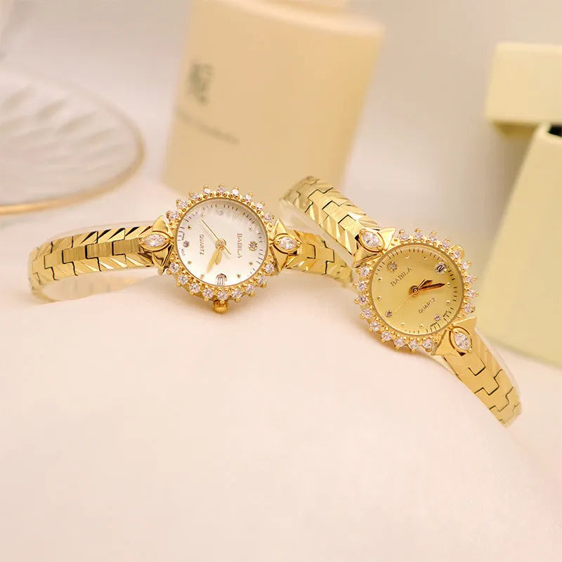 Gold quartz watch with embossed bracelet featuring 5A diamond detailing